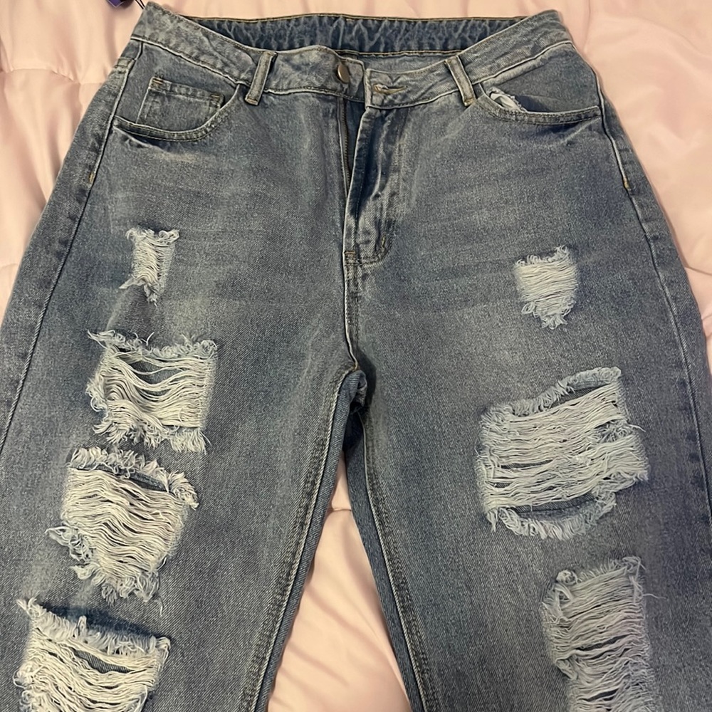 Denim light blue jeans , never worn , size 31Waist & 32 Length